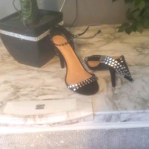 Black suede and silver high heel slingback shoes